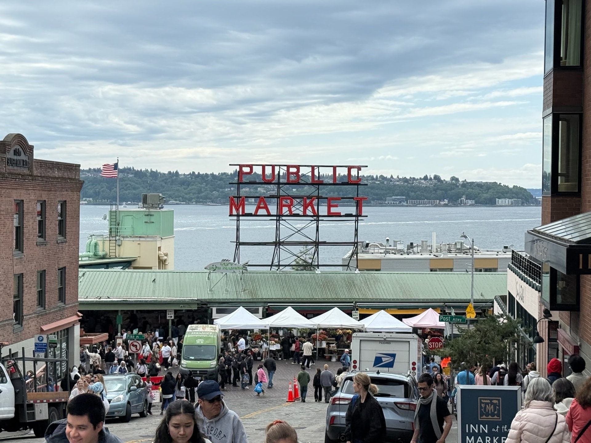 View overlooking Seattle Public Market sign with the waterfront behind it
