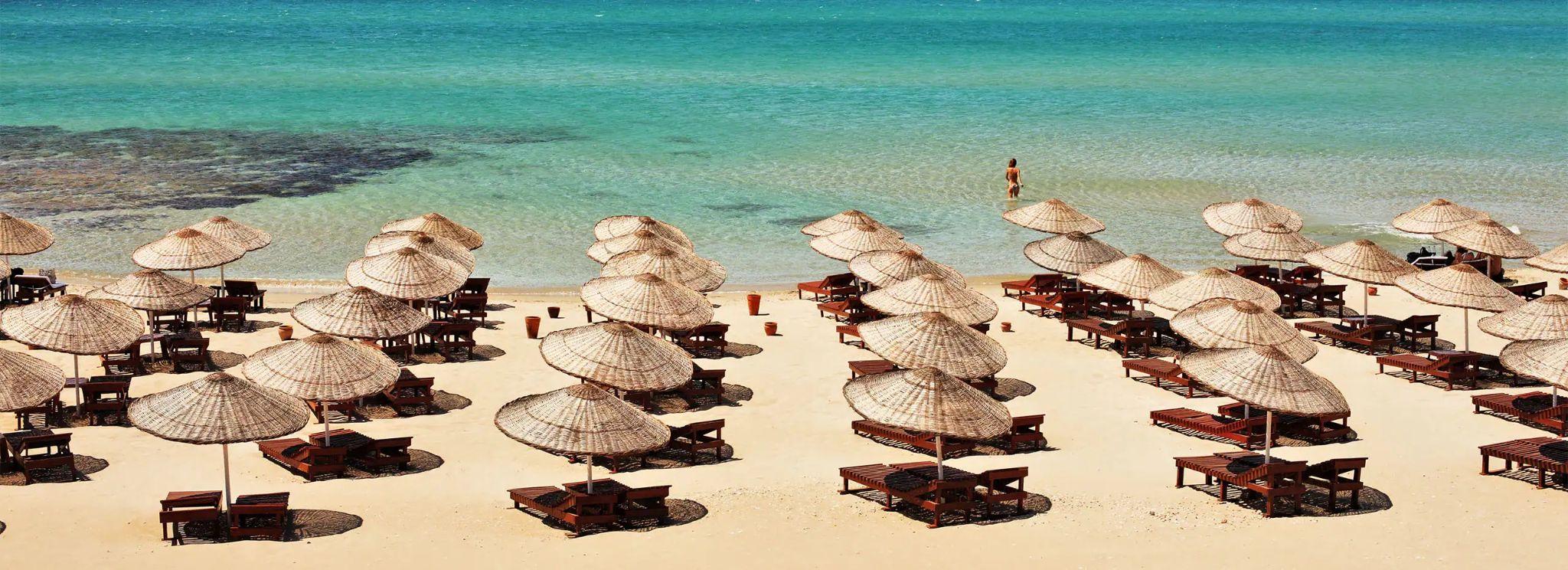 Beach cabanas on the Turkish coast at Çeşme